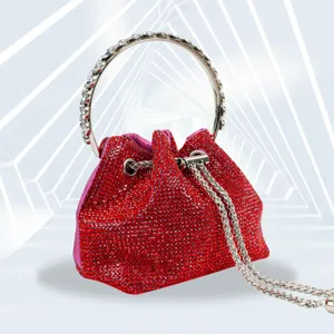 Stunning red rhinestone evening bag with round crystal handle and chain for party use.