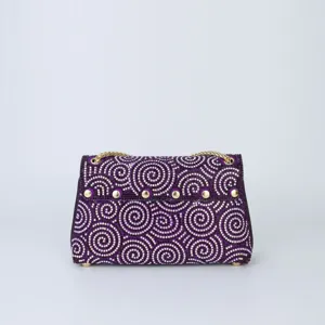 Elegant purple rhinestone evening shoulder bag with luxury gold chain and metal studs.