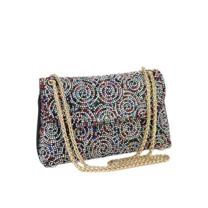 Sparkling crystal rhinestone shoulder bag with elegant gold chain for women evening party.