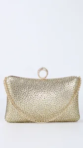 Detailed view of the sparkling gold rhinestone evening clutch bag with chic ring handle.