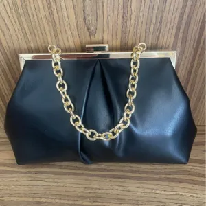 Black evening clutch bag with gold chain strap and metal frame closure for women parties