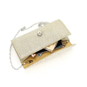 Gold glitter evening clutch bag detail showing interior capacity with chain strap for wedding.