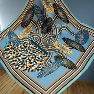 Elegant printed silk square scarf with chic striped border, perfect for women's stylish neck wear.