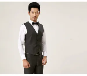 Men suit vest detail shot, slim fit waistcoat matched with white shirt and black bow tie.