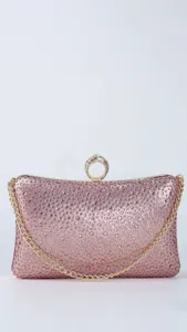Pink rhinestone evening clutch bag detail with gold chain and ring clasp, party purse.