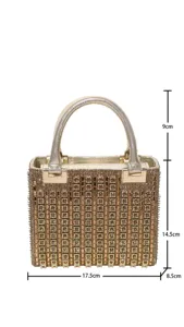 Closeup view of sparkling rhinestone evening bag, gold metal handle, elegant party purse details.