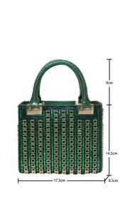 Detailed view of the green rhinestone evening handbag showcasing intricate vertical crystal stripes.