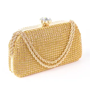 Gold rhinestone evening clutch bag with crystal clasp and chain strap for women weddings.