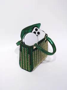 Green rhinestone evening clutch bag with top handle and spacious interior capacity detail shot.