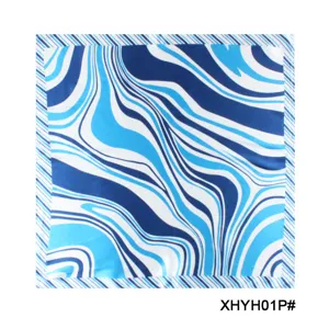 Blue abstract print silk square scarf detail, elegant neckerchief for stylish women wear.