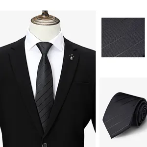 Classic men's black striped tie with professional suit display and fabric texture details.