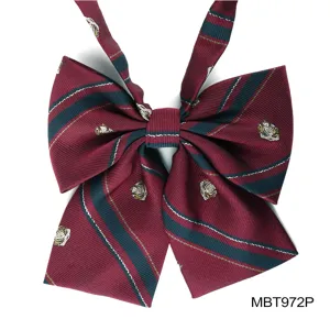 Detailed view of wine red and dark green striped JK bow tie with elegant crest pattern.
