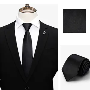 Classic black men's business tie with fabric texture and rolled display details.