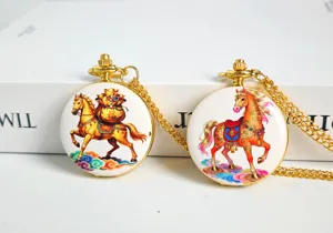 Vintage gold-toned pocket watch with auspicious Chinese horse print and chain necklace.