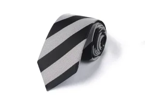 Close up detail of black and white striped necktie, classic formal business fashion design.