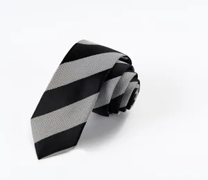 Close-up detail of classic black and white striped men necktie, elegant formal business style.