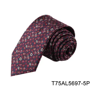 Detailed view of the men's dark blue floral jacquard necktie, showing fabric texture and tip.