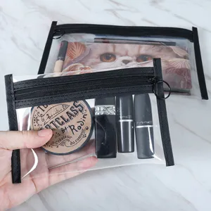 Clear waterproof PVC makeup bag with black zipper for travel and daily storage.
