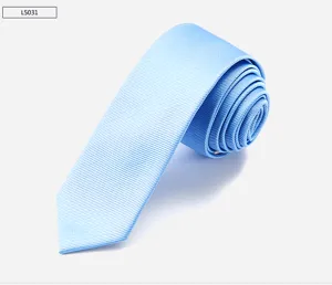 Light blue striped skinny necktie for men, stylish classic fabric accessory for daily wear.