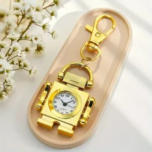 Gold robot pocket watch detail view, vintage quartz keychain pendant for kids and fashion.