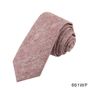 Close-up detail of the red-brown striped linen tie, showing the textured fabric fold clearly.