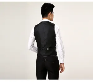 Back view detail of a slim fit black suit vest, showing tailored cut and back strap design.