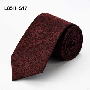 Men's silk business tie in dark red with classic black paisley pattern, elegant and stylish.