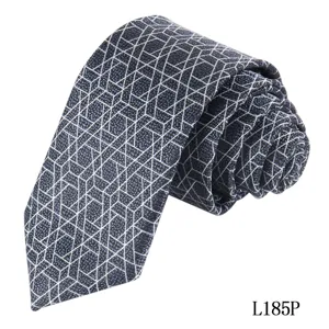 Detailed view of a dark blue men's necktie featuring a stylish white geometric cube pattern.