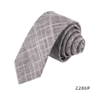 Grey plaid tie detail view, men's casual business cotton linen necktie close-up presentation.