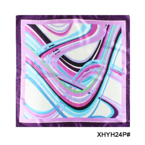 Close-up detail of women's silk square scarf featuring vibrant geometric wave print.
