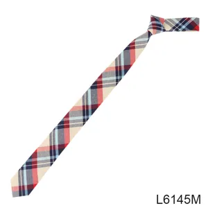 Detailed view of the narrow plaid college style cotton necktie, showcasing classic tartan pattern.