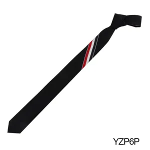 Detail shot of the black necktie featuring distinctive red white and blue diagonal stripes.