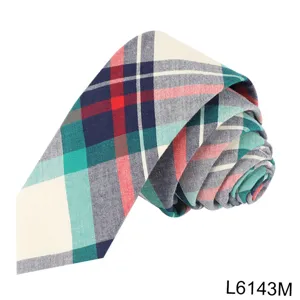 Closeup detail view of a classic college style plaid patterned cotton necktie in multi colors.