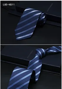 Silk tie detail showing exquisite blue striped jacquard pattern and fine texture for business.