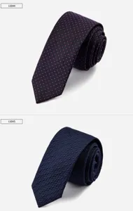 Close-up detail of stylish men's narrow tie with textured pattern and elegant design.