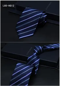 Detail view of the silk striped business tie, showing exquisite jacquard texture.