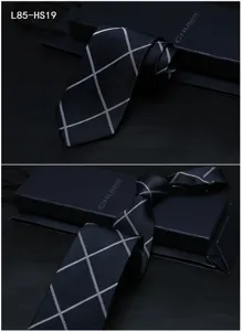 Detailed view of luxury men silk jacquard business tie with elegant silver grid pattern.