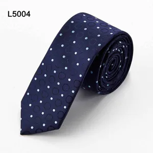 Men's narrow navy blue necktie featuring stylish light blue polka dots and elegant patterned design.