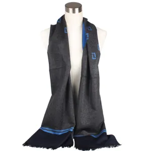 Detailed view of the stylish dark grey and blue silk jacquard scarf displayed on mannequin.