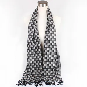 Black and white geometric jacquard scarf with tassels, classic design product detail view.