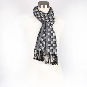 Detailed closeup view of the black and white checkered scarf featuring stylish black tassels.