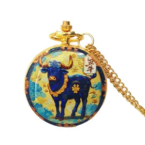 Golden Chinese zodiac ox pocket watch necklace with vintage blue dial design for gifts.