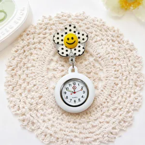 Silicone nurse watch with cute smiley flower design, retractable clip pocket watch detail.