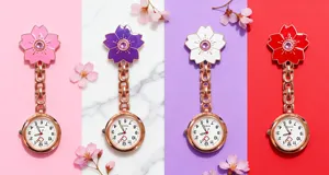 Detailed close-up view of vibrant cherry blossom nurse watches with quartz movement and chains.