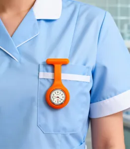 Silicone nurse fob watch with brooch pin, clear dial and quartz movement for medical use.