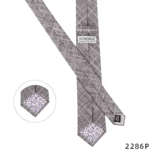 Men's gray plaid cotton linen necktie with purple floral lining for casual formal wear.
