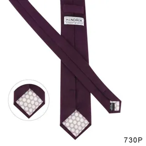 Classic dark purple men's cotton necktie featuring a stylish polka dot lining detail.