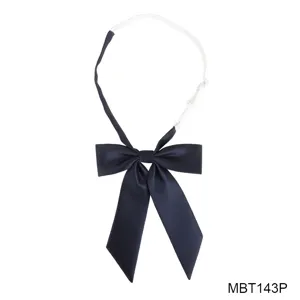 Navy blue JK uniform ribbon detail shot, classic Japanese school style bow tie with strap.
