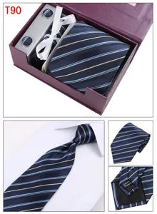 Detailed view of men's navy blue striped silk tie gift set with cufflinks and pocket square.