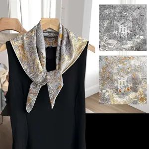 Luxury silk square scarf with intricate jungle and architectural print, elegant accessory.